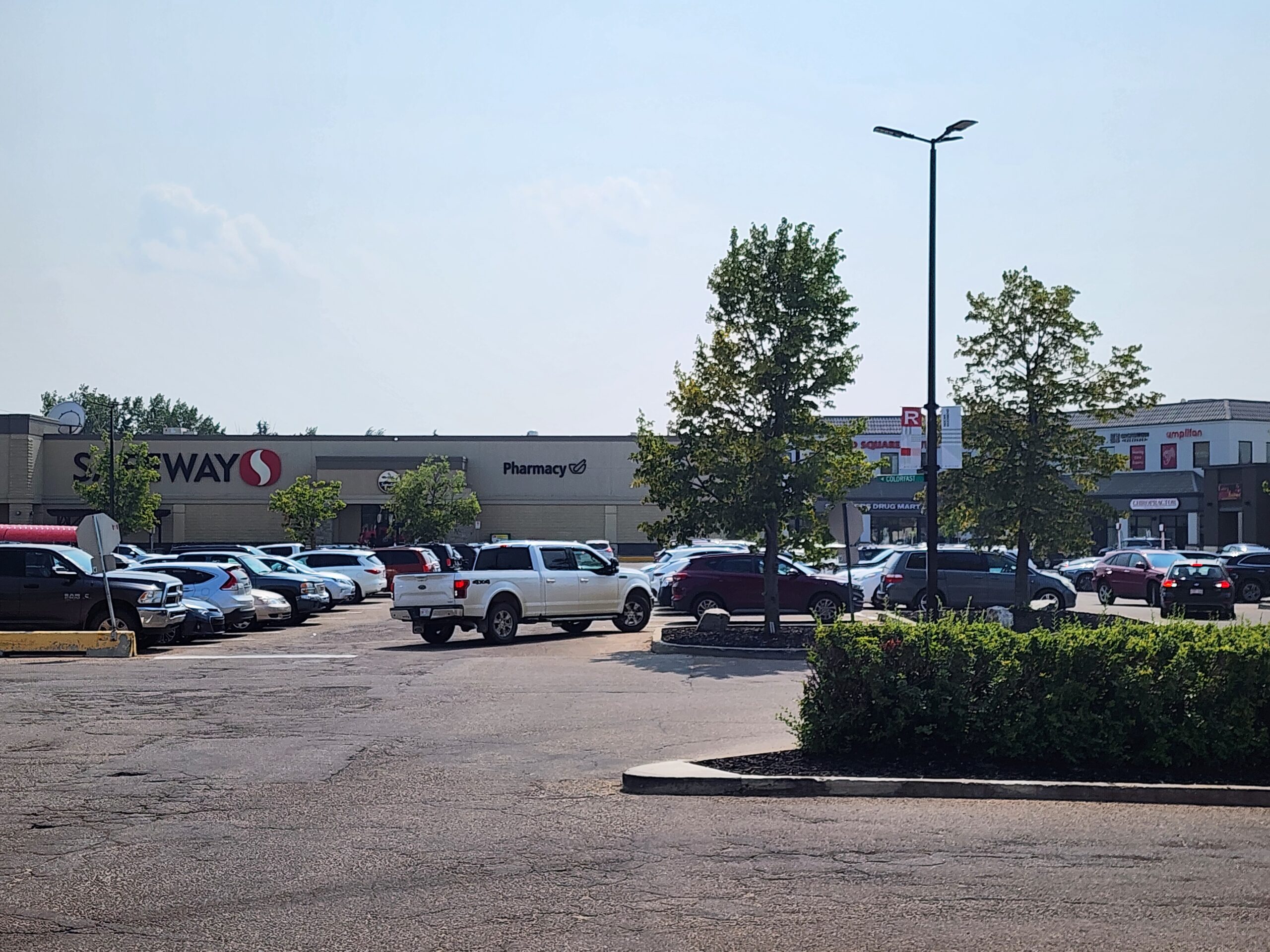 Parking lot outside of Riverbend Chiropractic & Wellness Office and Safeway