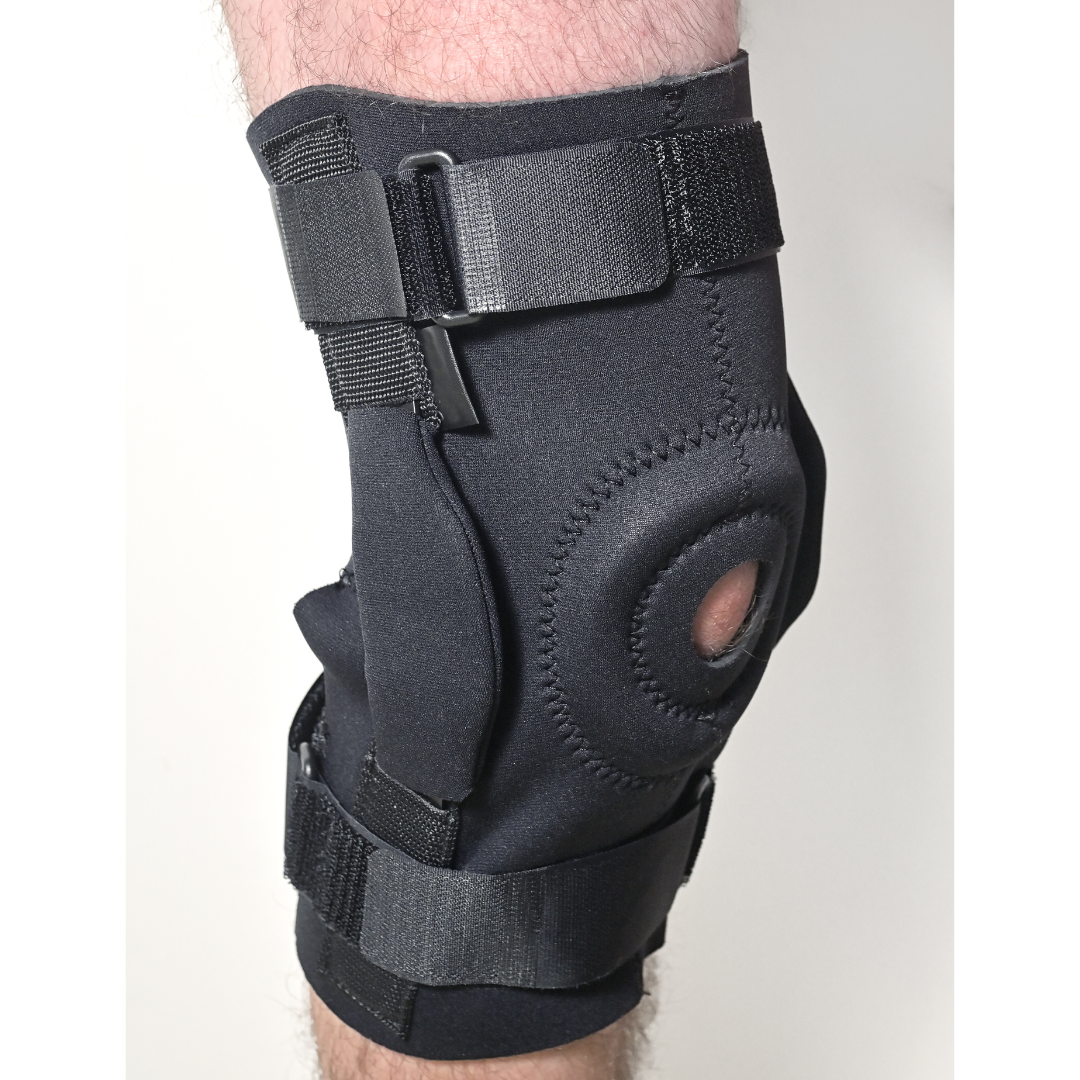 a knee brace on a mans leg