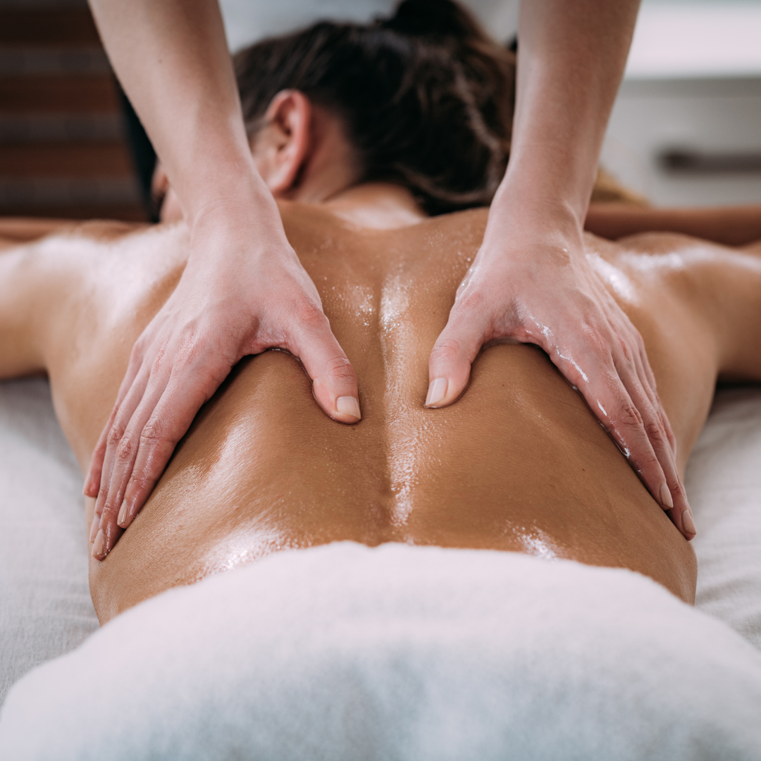 woman laying down getting a massage