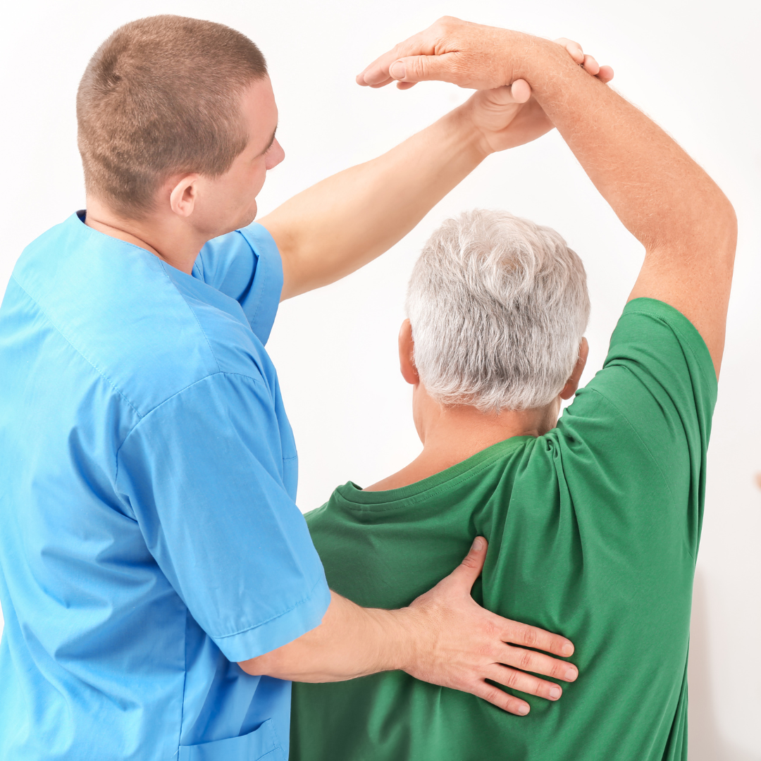 a chiropractor performing treatment on a senior male patient