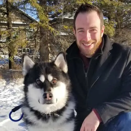Chiropractor Dr. Joseph Tanti with his dog Moose