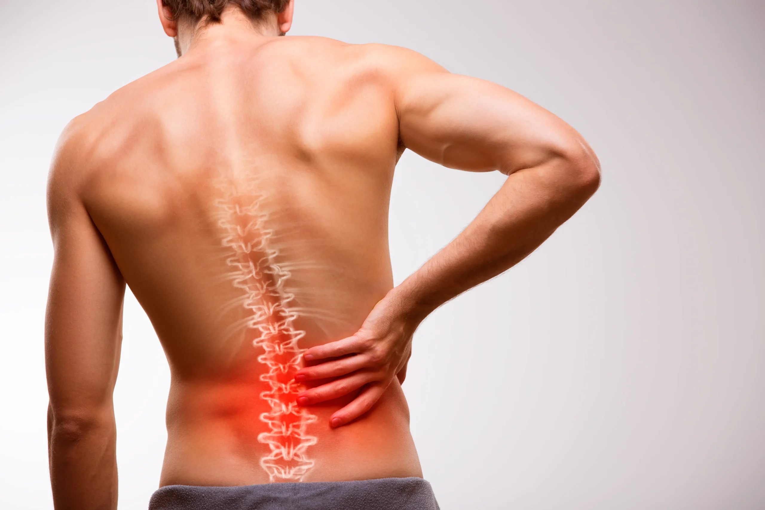 man with spine pain