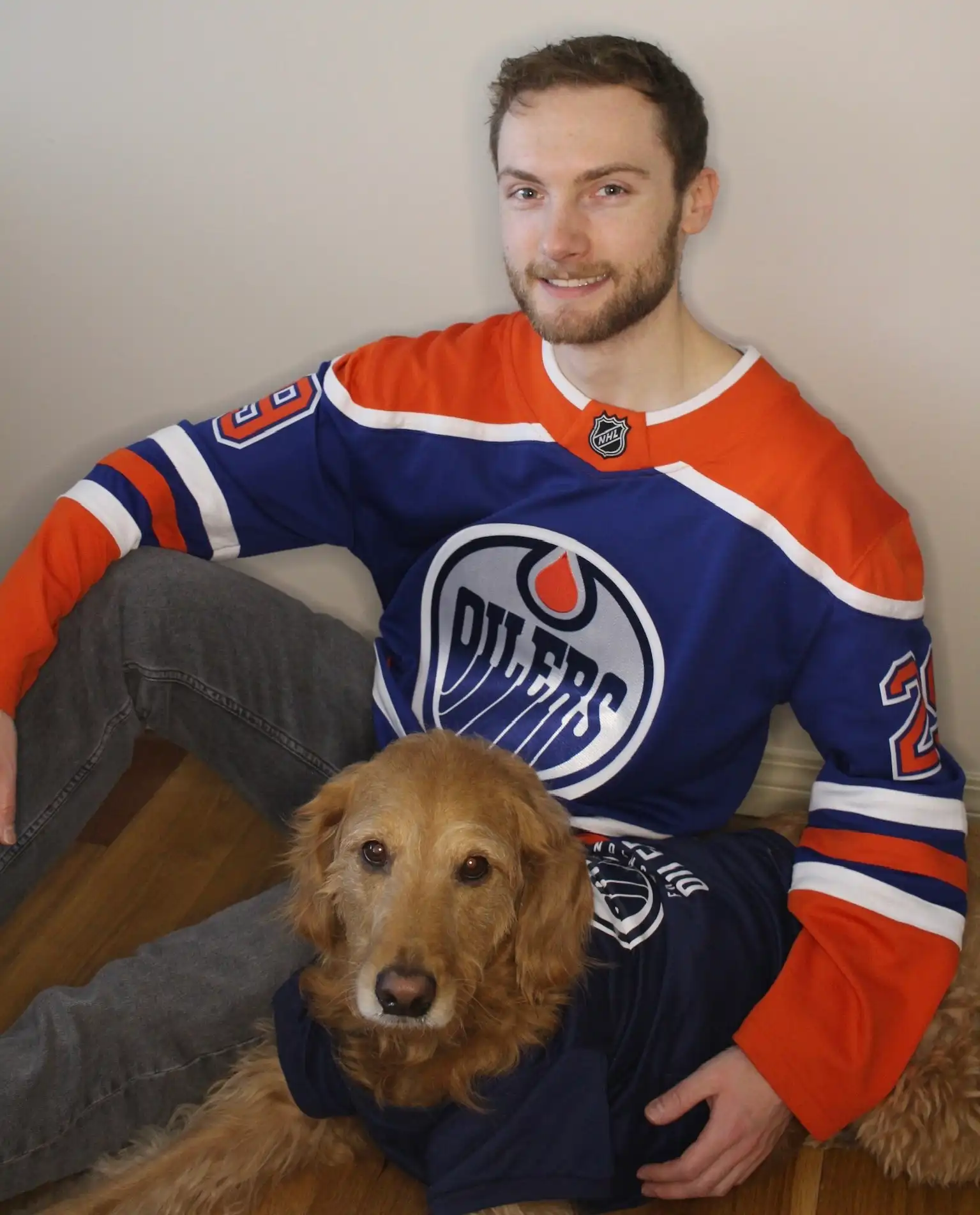 Dr. Ethan Marler and his Golden Retriever